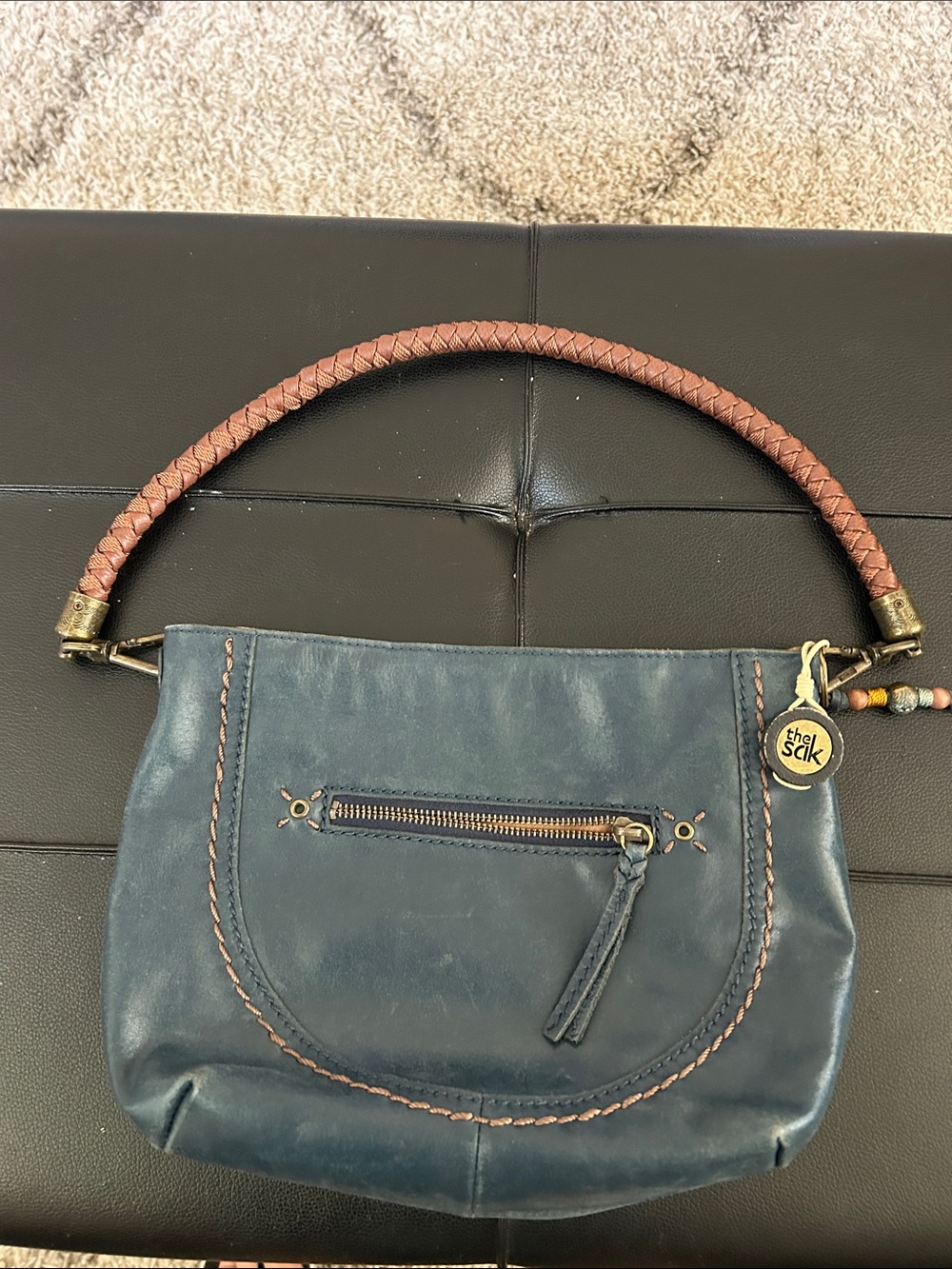 The Sak Teal Leather Shoulder Bag with Braided Brown Handle